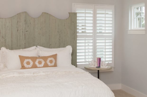 Plantation shutters in a bedroom